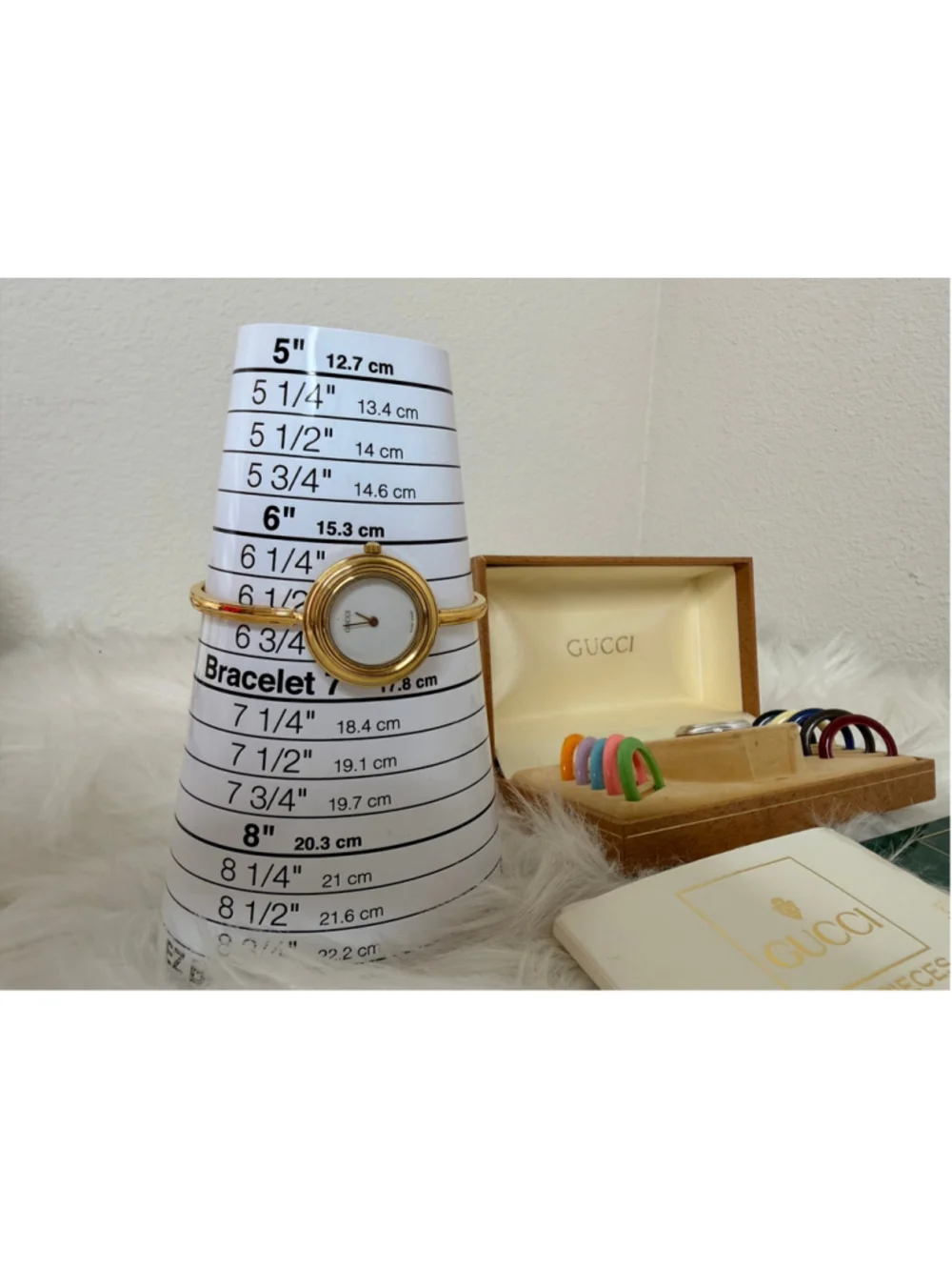 Gucci 11/12.2 Interchangeable Bezel Bangle Watch, w/ 12 bezels, box & paperwork